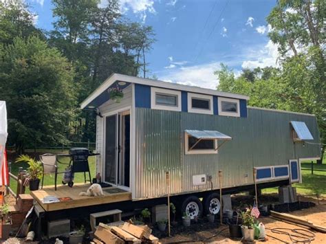 metal clad tiny house fold down deck wheels|tiny metal homes for sale.